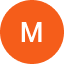 Orange circle with white letter M centered inside.